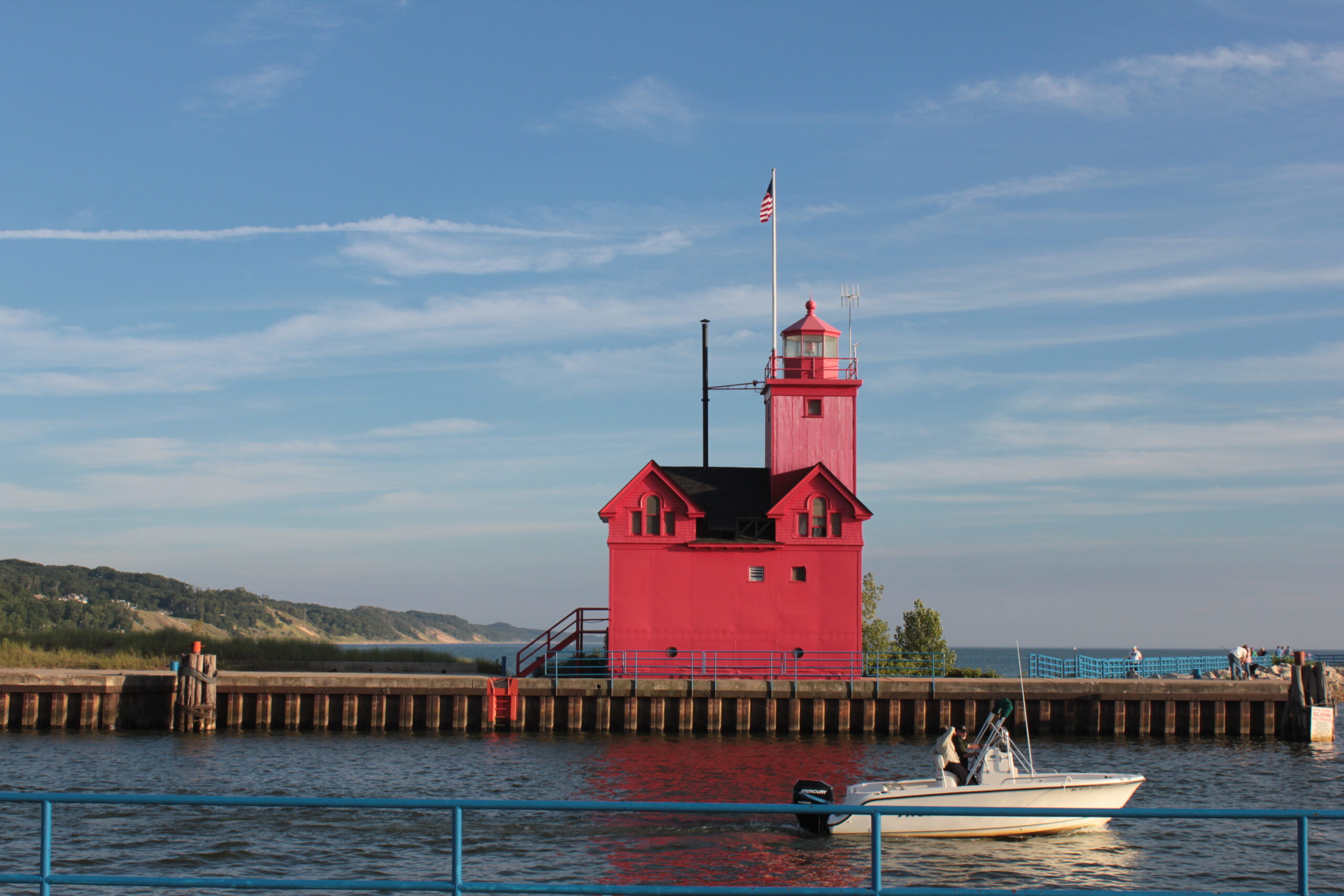 Red lighthouse building by the water